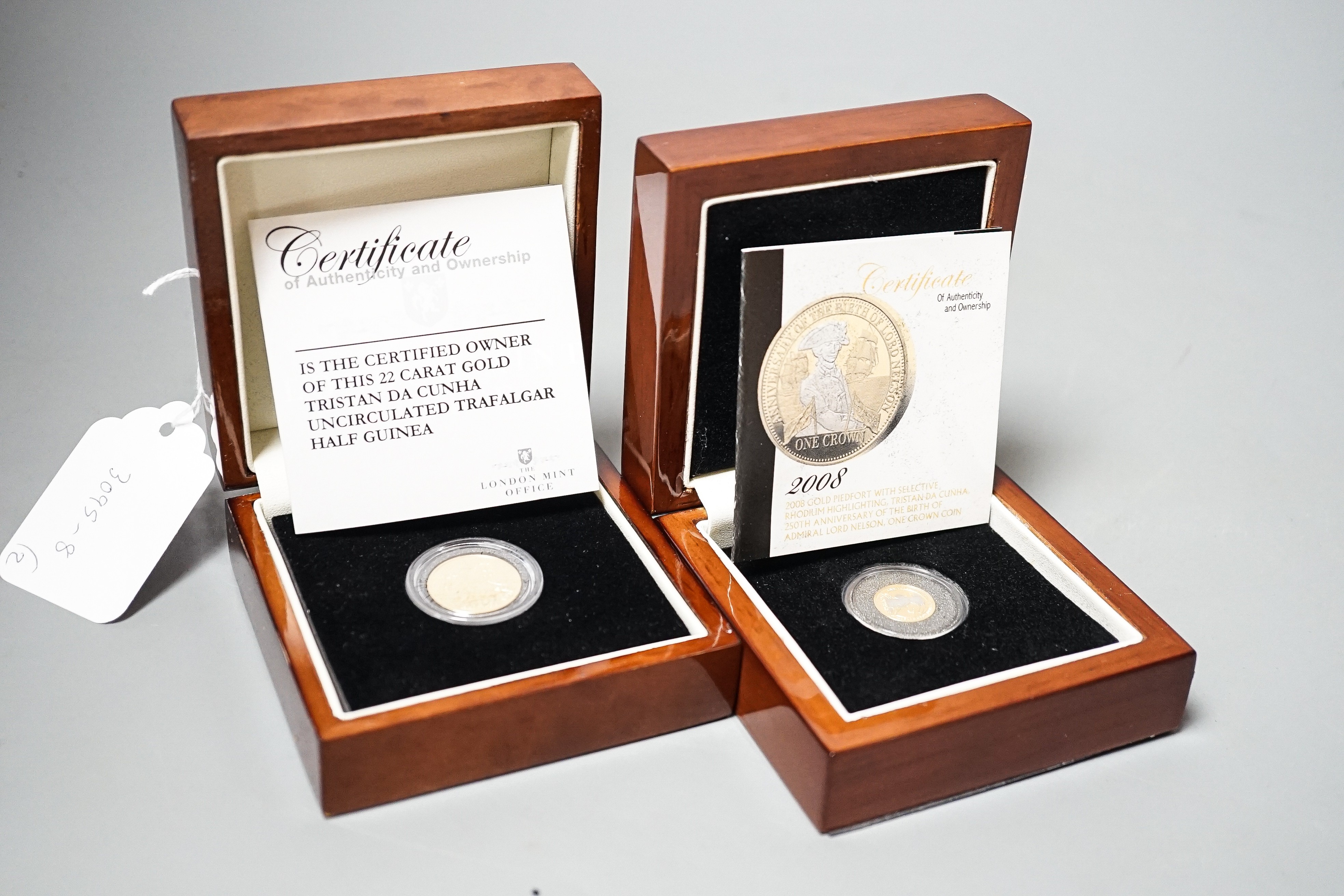 A London mint Tristan da Cunha gold half guinea, Brilliant Unc, and a similar gold piedfort one crown, cased with certificates (2)